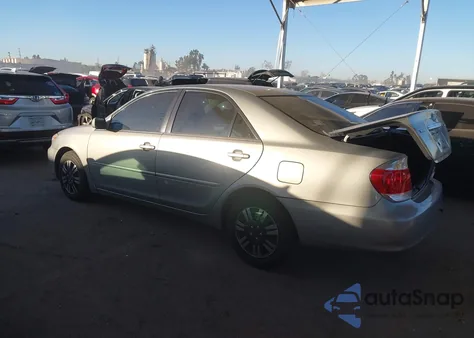 2005 Toyota Camry Le from USA, damaged, VIN 4T1BE32K95U528111